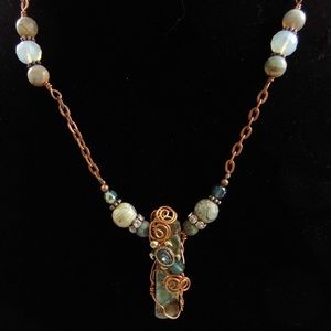 Hand crafted turquoise jasper turtle necklace